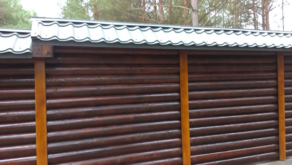 Цена на забор из оцилидрованного бруса